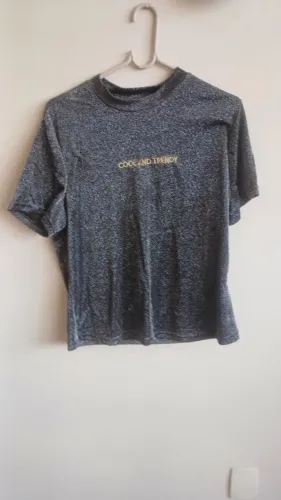 Blusa preta com acabamento brilhante em lurex - GG