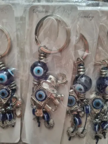 Brinde final de ano! 29 unidades de Chaveiros olho grego para sorte.