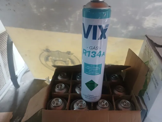 Gás R 134 Refil  750 ml ,caixa com 12 unidades  vendo as 04 caixas retirada  no local 