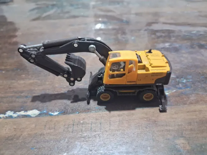 Retroescavadeira miniatura HO Siku