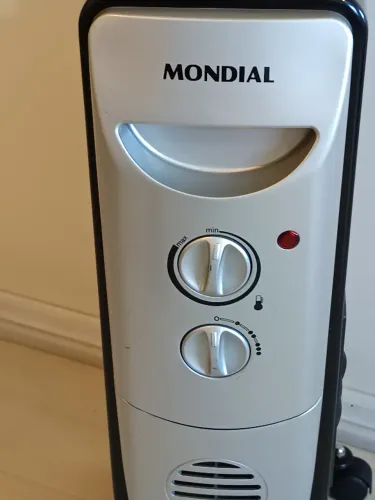 Aquecedor Mondial á óleo 1500W 127V perfeito