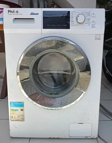 Máquina de lavar com defeito.