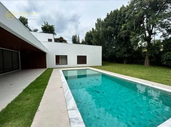 Casa com 4 dormitórios à venda, 400 m² por R$ 5.500.000,00 - Condomínio Residencial Lago A