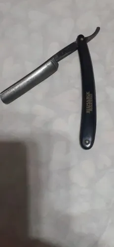 Navalha marca Bismarck Made In Solingen Germany, com cabo em baquelite preto