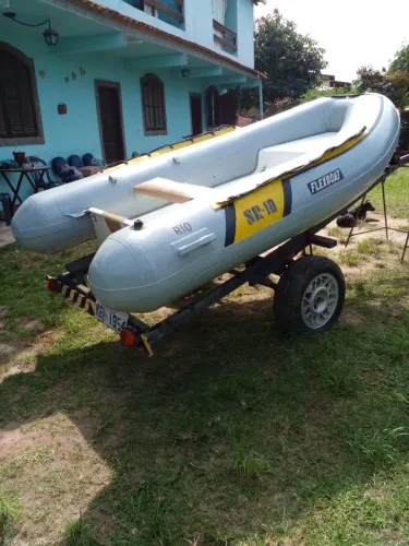 Vendo bote inflável com casco de fibra