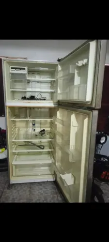 Geladeira inox com defeito.
