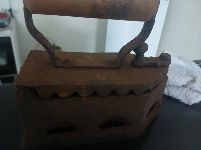 Ferro de brasa antigo