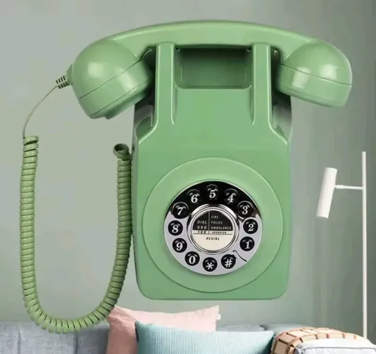 telefone fixo retrô de parede com discagem rotativa