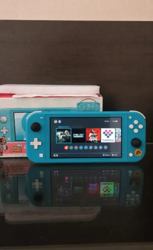 Nintendo Switch Lite Desbloqueado "IMPECÁVEL" Com 128gb lotado de jogos!!! Faço Olx Pay!