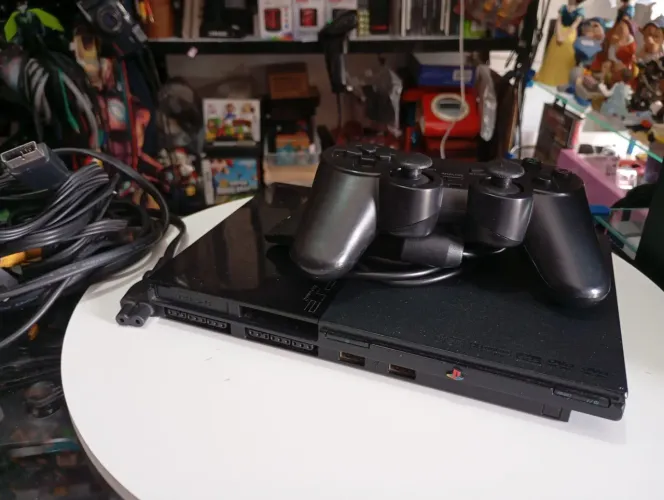 Vídeo game PS2 com controle alternativo leia a descrição