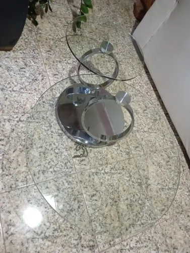 Mesa de centro giratória 2 tampos , estrutura aço inox.