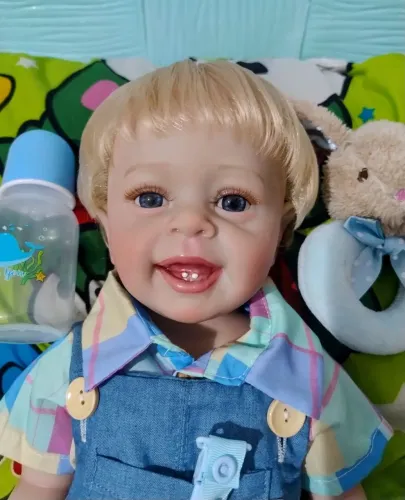 Bebê Reborn menino loiro corpo de vinil