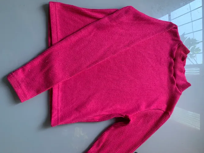 Blusa rosa de mangas longas 