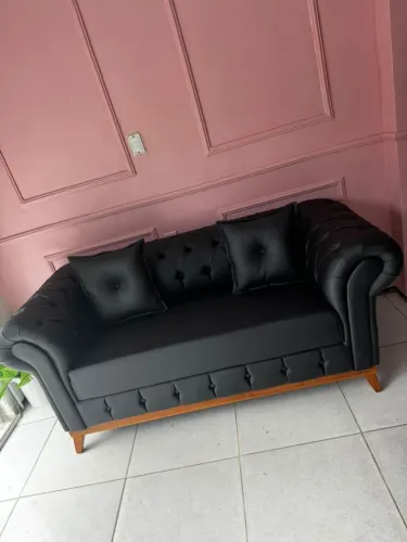 Sofá no tecido facto