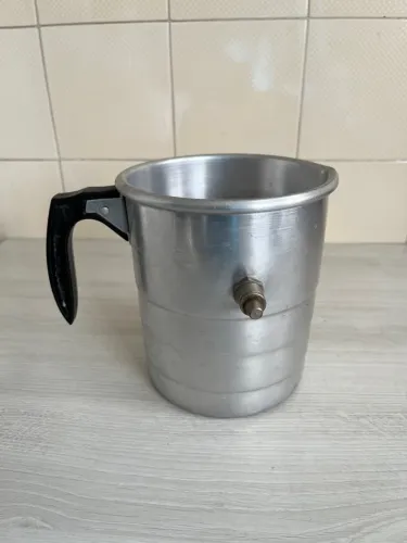Leiteira antiga que apita
