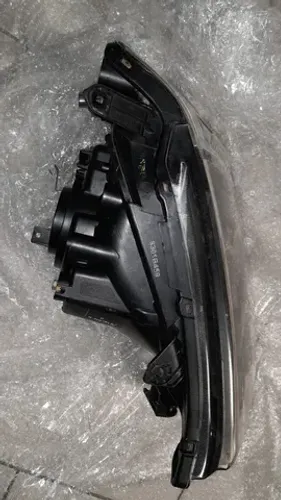 farol dianteiro direito l200 triton 2012