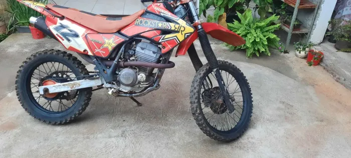 Tornado 250 td revisada 7.500 top aceito troca por gado. 