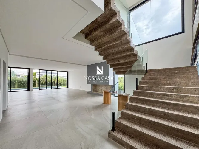 Casa com 5 quartos sendo todos suítes no condomínio Ocean Side em Torres/RS