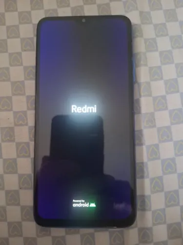 Celular Redmi 9T Azul, funcionando perfeitamente