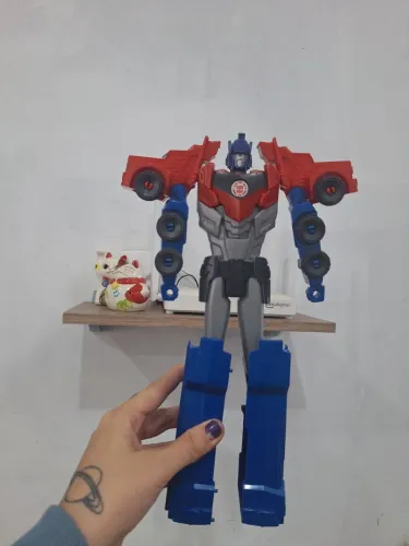 Boneco Robô e caminhão Transformers 2 em 1