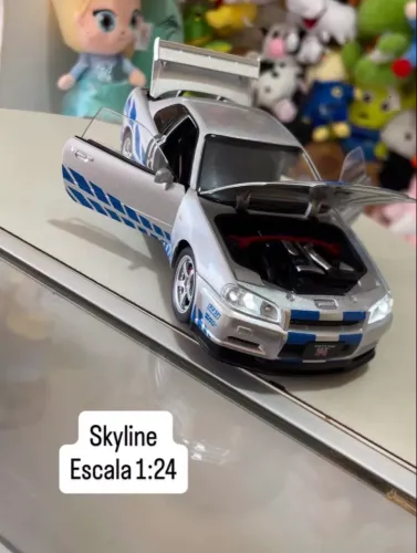 Carrinho metal Skyline abre as portas e emite som