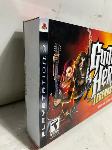 Guitarra de video game acompanhado com o jogo guitar hero 3