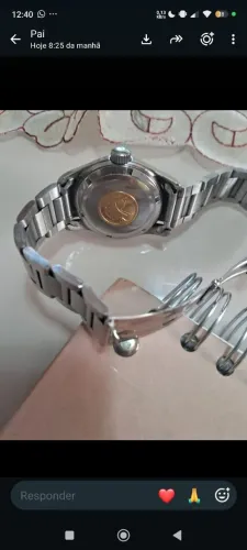 Relógio eterna Matic contic fundo de ouro