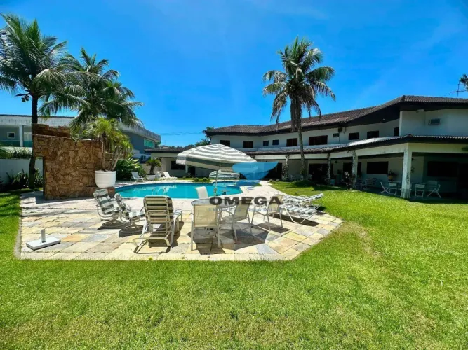 Casa à Venda no Condomínio Jardim Acapulco no Guarujá | Omega Imóveis