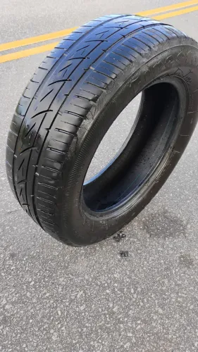 Peneu meia vida em bom estado 