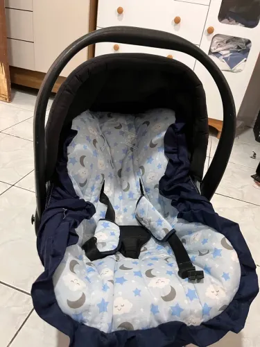 Bebê conforto Burigotto com suporte e capa