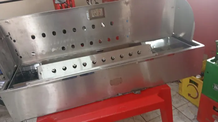 Churrasqueira giratória com 12 espetos nova está top 