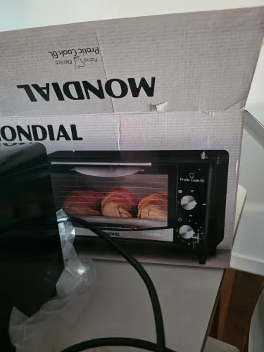 Vendo mini forno elétrico  novo na caixa. 