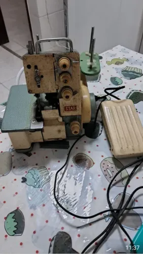 Vendo máquina de costura star overloque portátil