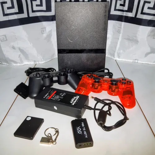 PS2 Slim com 2 controles, 24 jogos e leitor funcionando