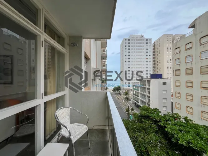 Apartamento com varanda vista mar na beira mar da praia nas Pitangueiras, Guarujá