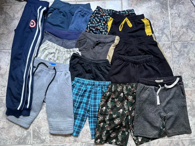 Lote com 14 shorts e 1 calça infantil menino 6 a 8 anos 