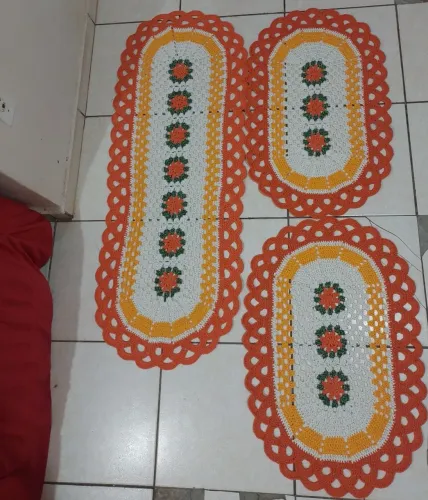 Jogo de tapete de crochê