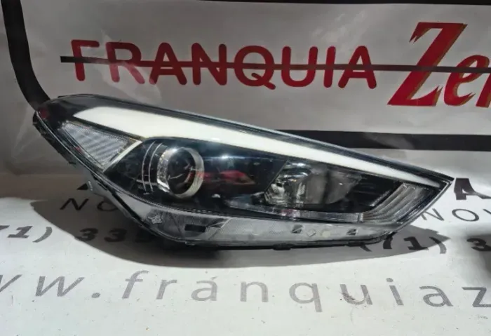Farol dianteiro direito New Tucson