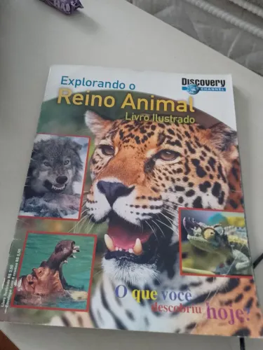 Livro ilustrado Explorando o Reino Animal.