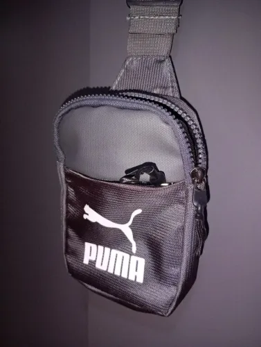 Beg da puma. Cor: cinza escuro. Nunca usado!! E permeável. Perfeita estado.