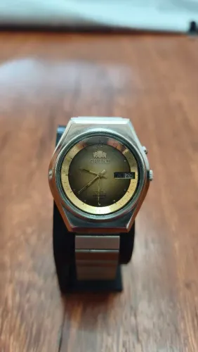 Relógio Orient, Automático, Vintage na cor ouro envelhecido, Todos botões perfeitamente fu