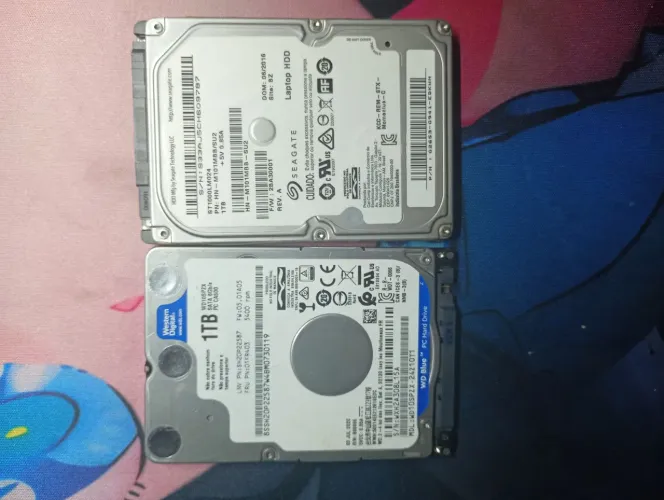 2 HD's De 1T (Funcionam perfeitamente).