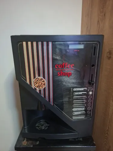 Máquina de café grão