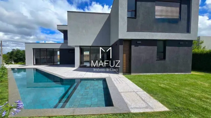Residência Contemporânea de Alto Padrão com 4 Suítes e Piscina Aquecida em Alphaville Lago