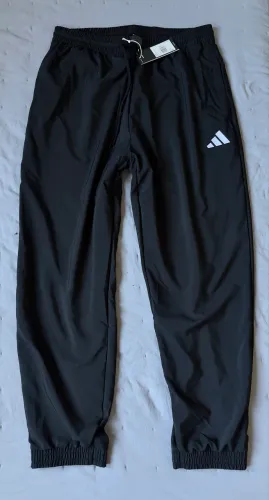 calça esportiva adidas importada com forracao e bolsos tamanho g 