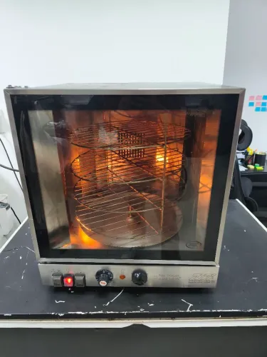 Forno elétrico com grade giratória