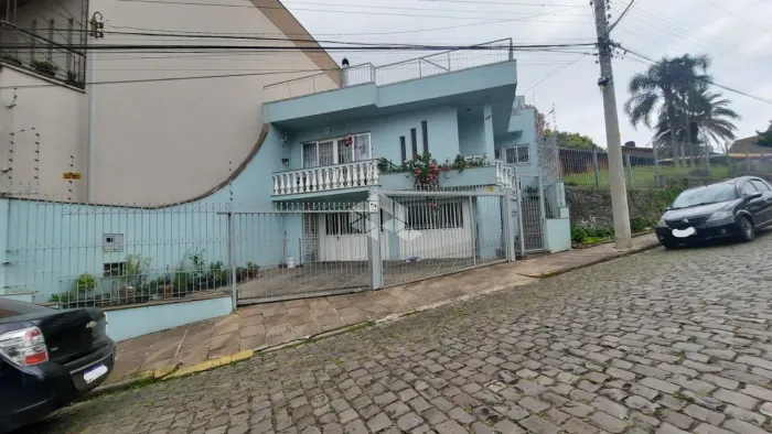 Linda casa no Pio X. Opção de moradia e empresa