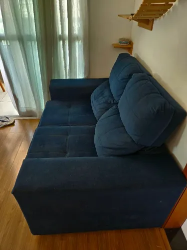 Sofá retrátil azul