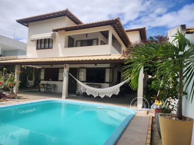 Casa em condomínio estrada do coco