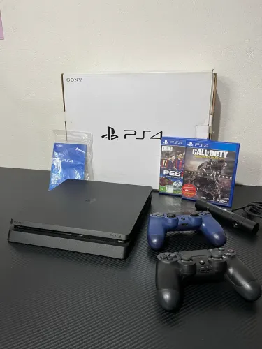 PS4 Slim 1Tb + 2 Controles + 2 Jogos + PS Camera | Possível desbloquear